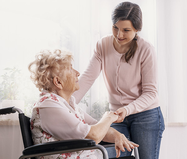 young-helpful-granddaughter-helps-her-grandmother-2021-08-27-16-16-28-utc